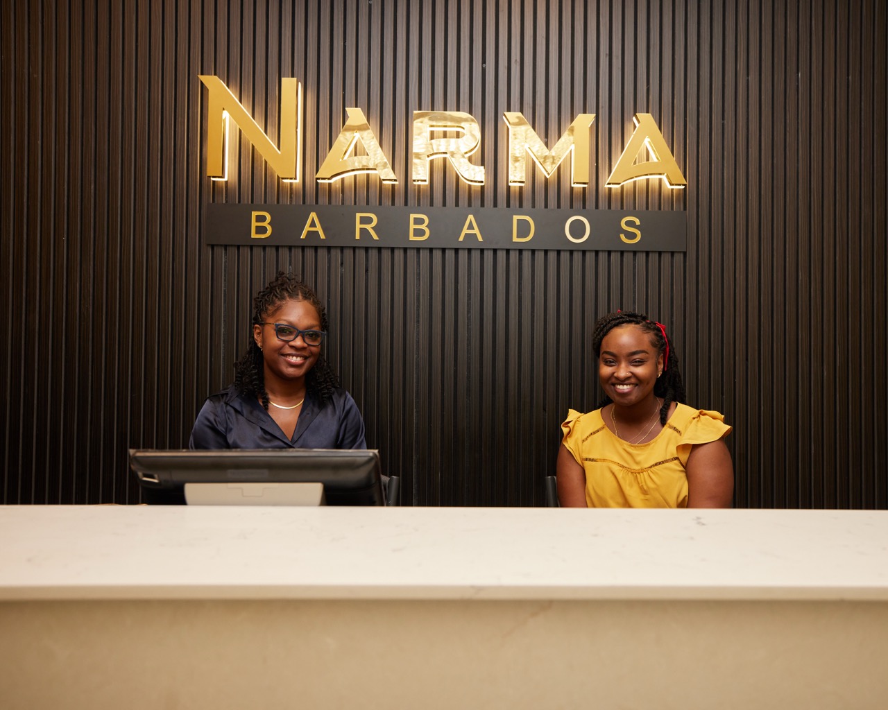 Guests arriving along the boardwalk at golden hour